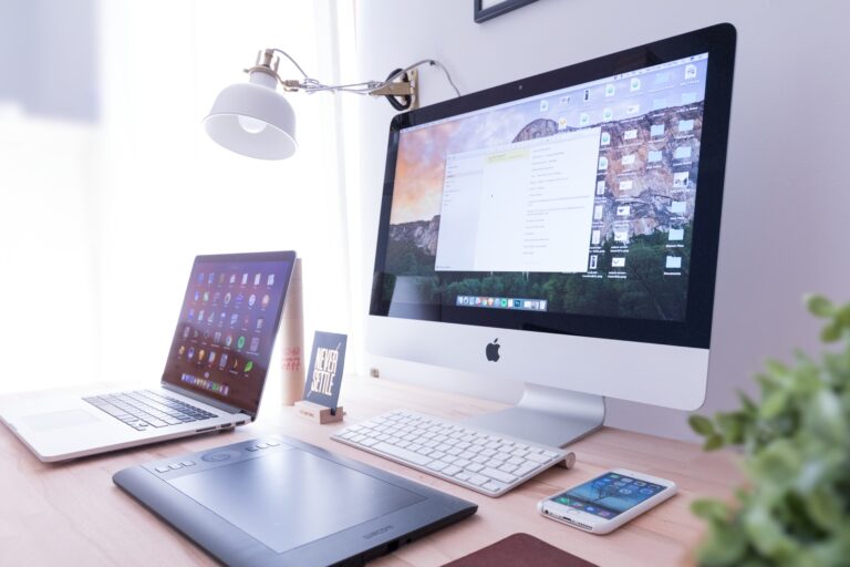 iMac and MacBook on Desk